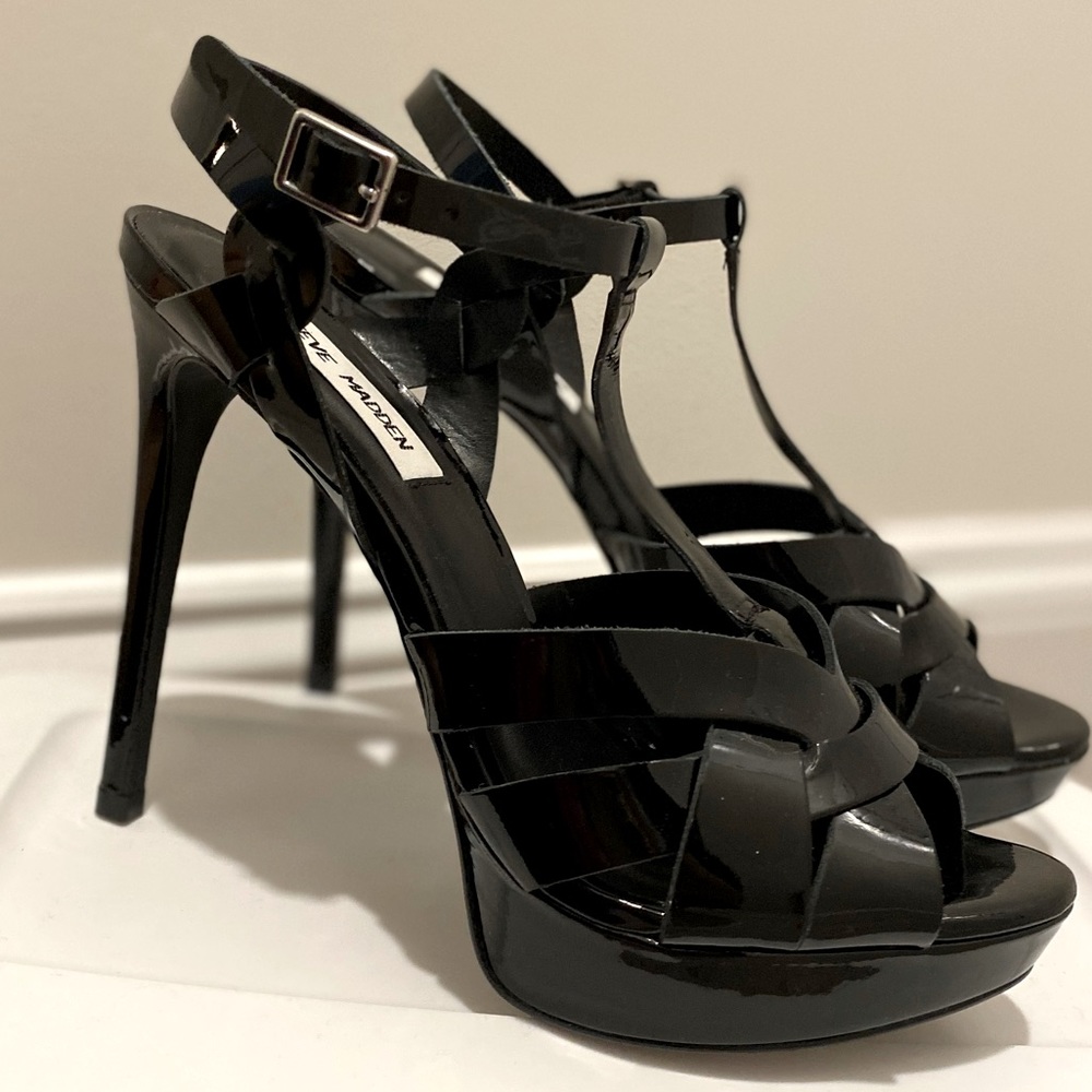 Black patent heels size 8.5 never worn.